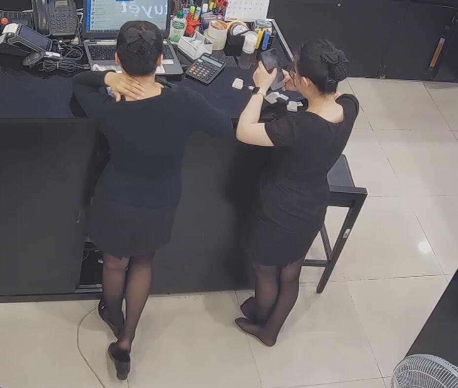 The jewelry store hostess in black nylon show us her cute feet! 240