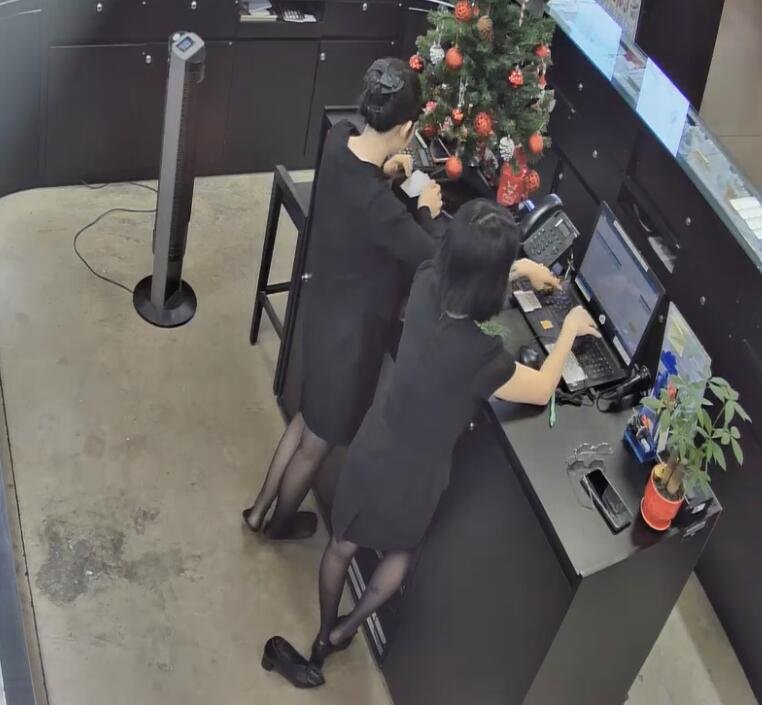 The jewelry store hostess in black nylon show us her cute feet! 266