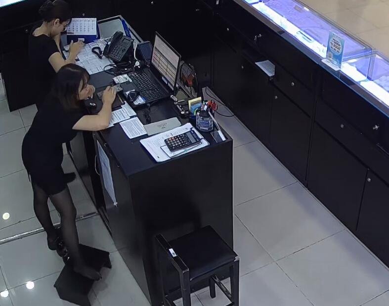 The jewelry store hostess in black nylon show us her cute feet! 284