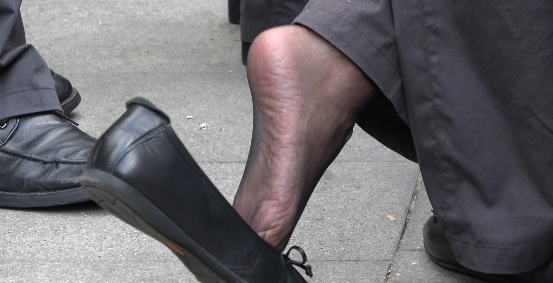 Lady in black nylon and flats stand up great dipping shoeplay 