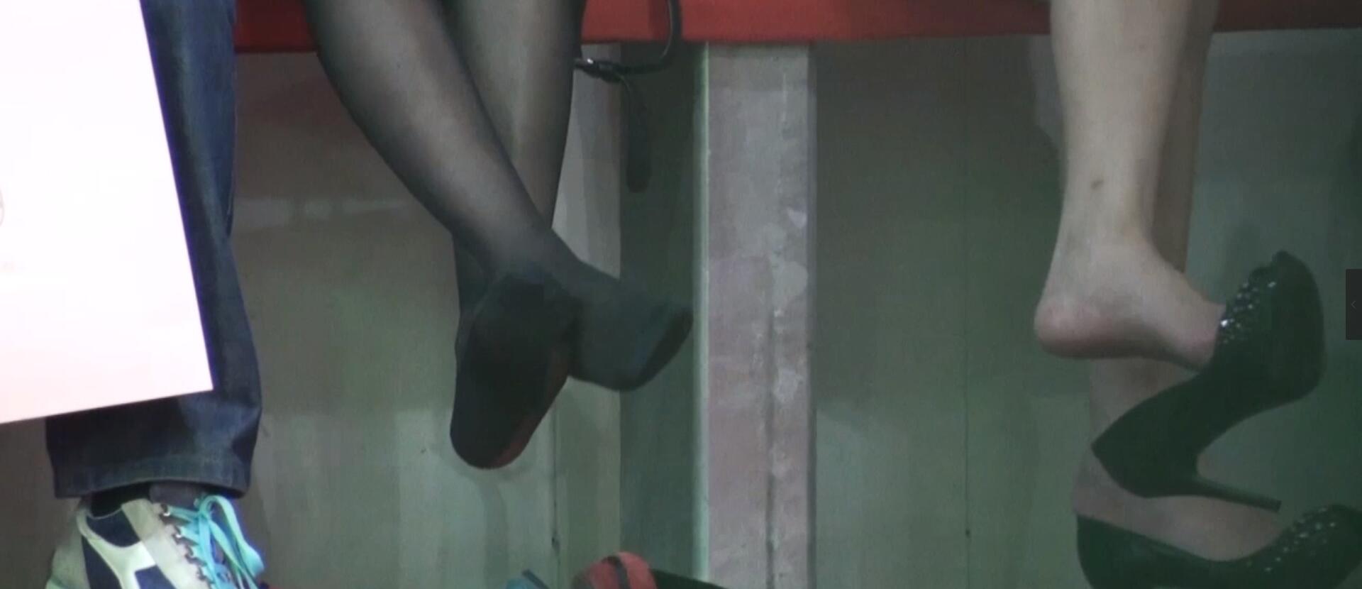 2xhostess relax their feet at same time 15