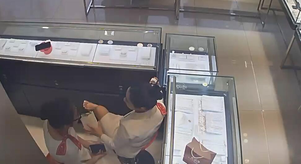 The jewelry store hostess in white dress great dangling shoeplay 36