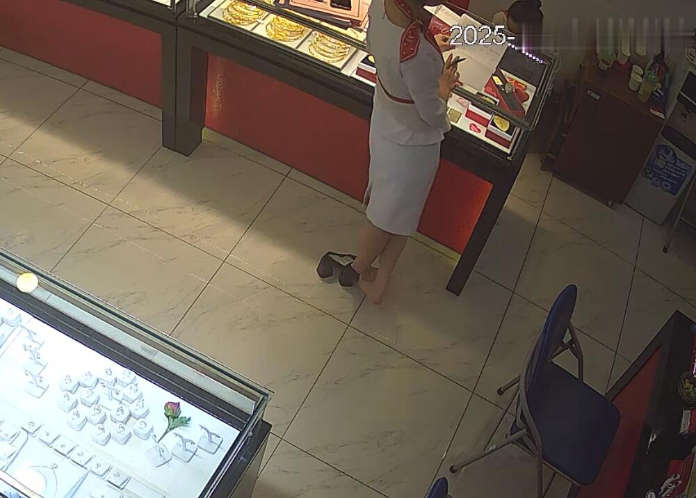 The jewelry store hostess in white dress great dangling shoeplay 37
