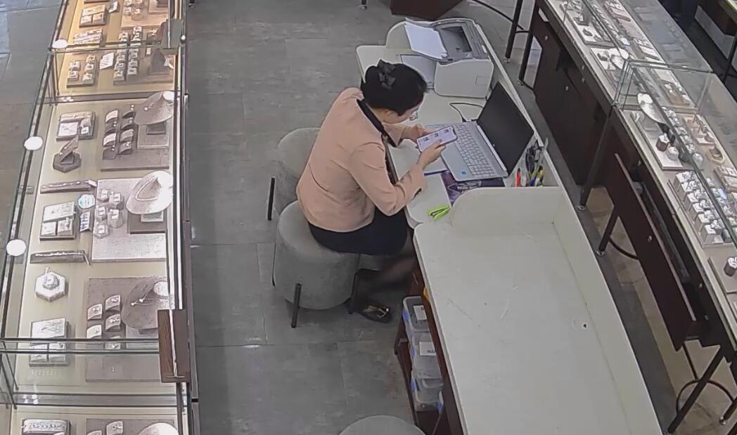 The jewelry store hostess in black nylon dipping shoeplay under the table 6