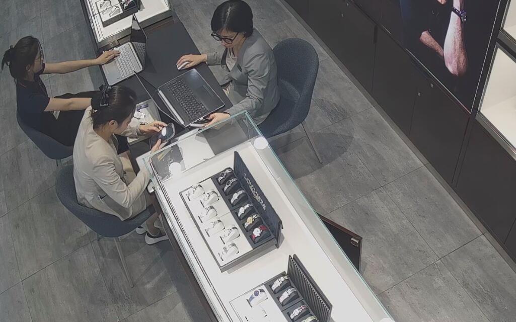 The jewelry store hostess in white dress and white heels sit down shoeplay 2