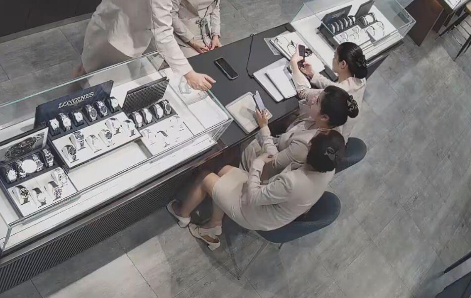 The jewelry store hostess in white dress and white heels sit down shoeplay 5
