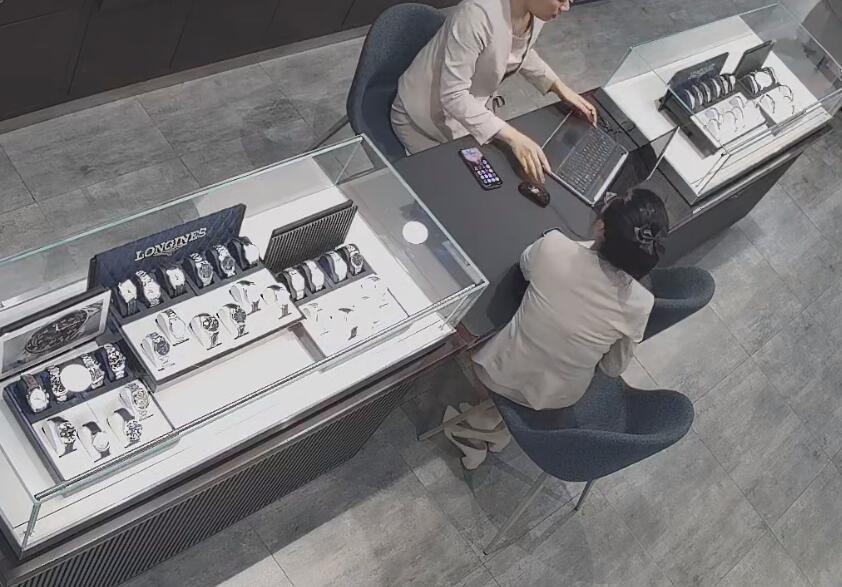 The jewelry store hostess in white dress and white heels sit down shoeplay 7