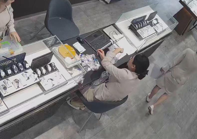 The jewelry store hostess in white dress and white heels sit down shoeplay 12