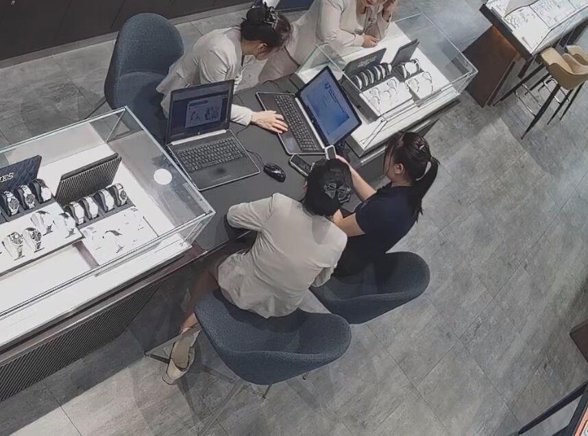 The jewelry store hostess in white dress and white heels sit down shoeplay 14