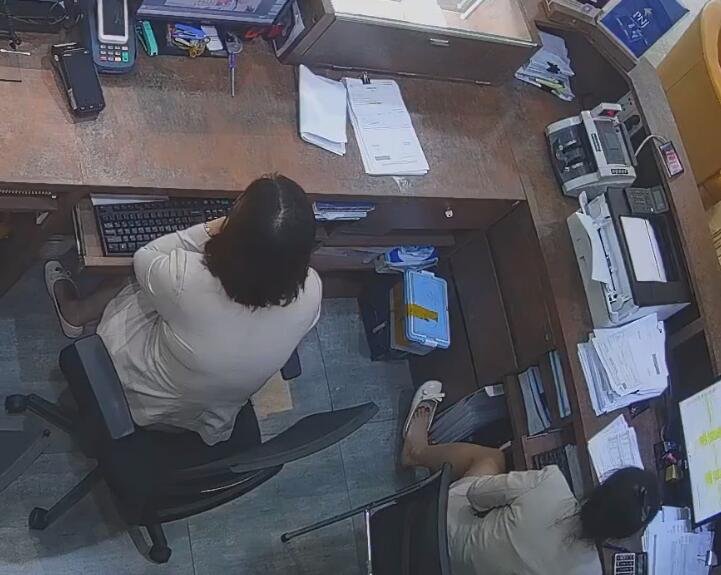 The jewelry store hostess in white dress and white heels sit down shoeplay 15