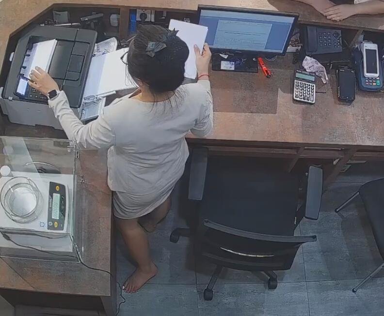 The jewelry store hostess in white dress and white heels sit down shoeplay 17