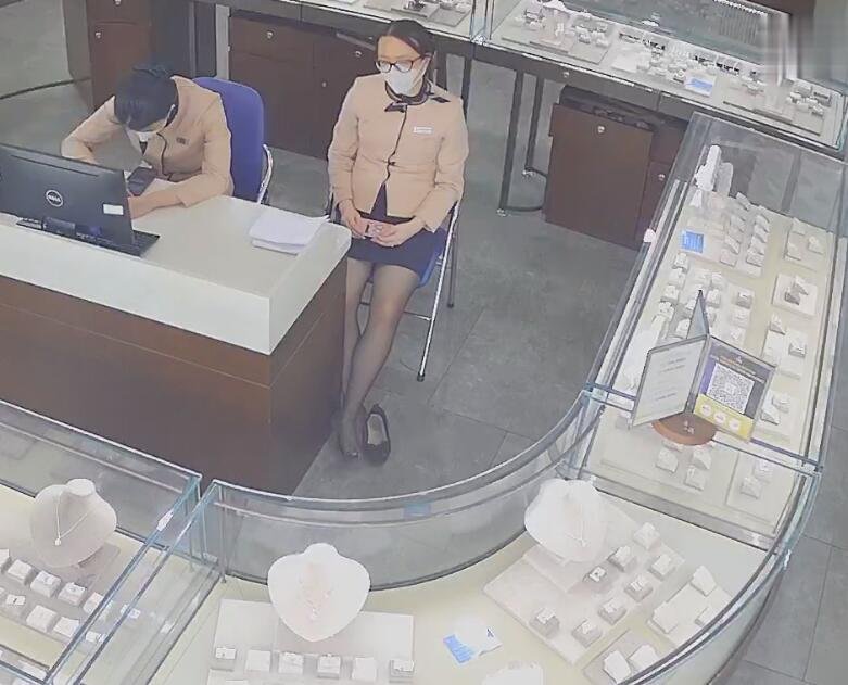 The jewelry store hostess show us her cute feet