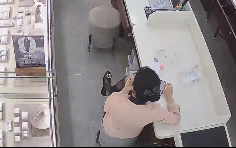 The jewelry store hostess in black nylon dangling dipping and shoeplay